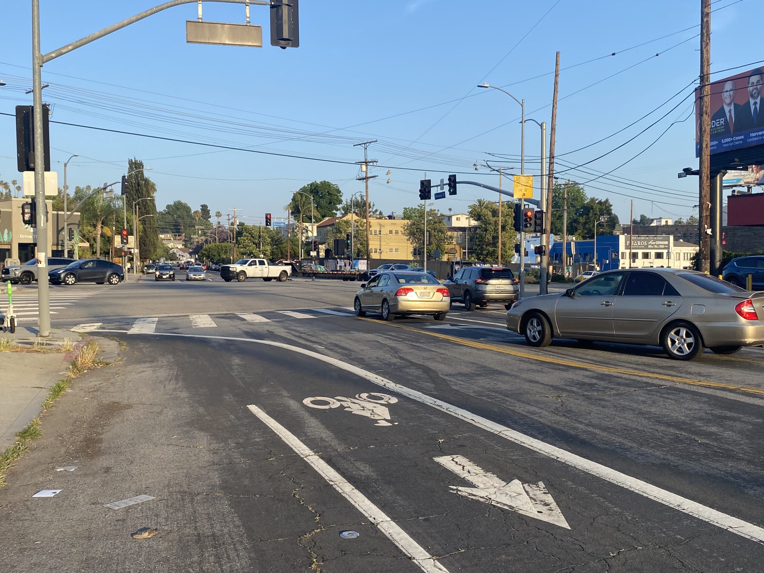 A standard class I bike lane marked off in white lines with a bicycle symbol lane marking. At the intersection of Glendale Boulevard and Montana St.